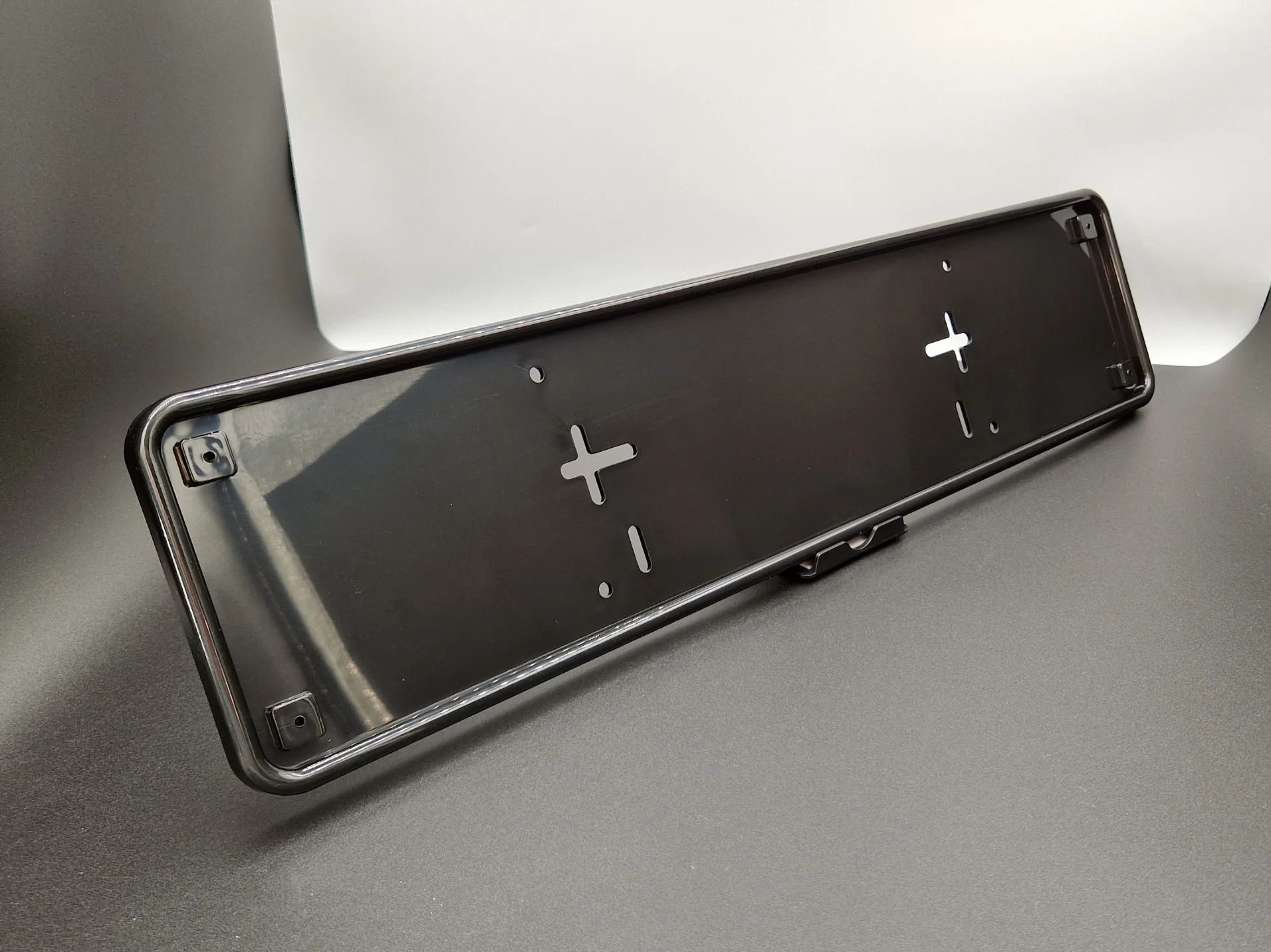 Hoogwaardige zwarte opschroefbare PVC autoplaathouder